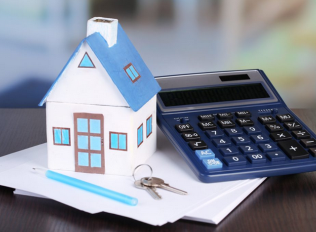 maison et calculatrice pour un investissement locatif