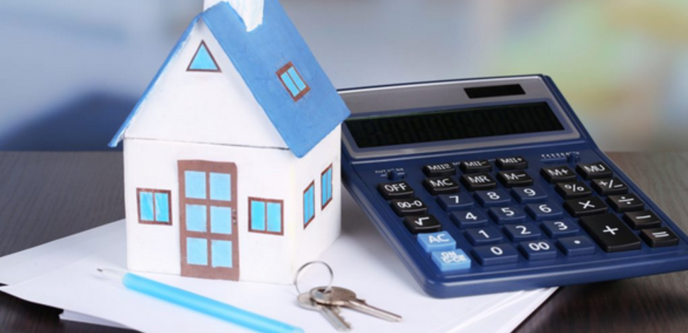 maison et calculatrice pour un investissement locatif