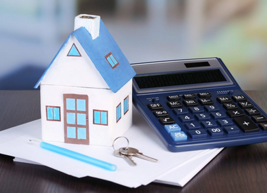 maison et calculatrice pour un investissement locatif